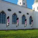 Angled Feather Advertising Flag for Marketing displays printed on durable Polyester fabric. retail outlets, real estate agencies | Printmagic