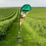 Teardrop Flags with cross base and Stake outside Farm, businesses, events, exhibitions help promote sales | Printmagic